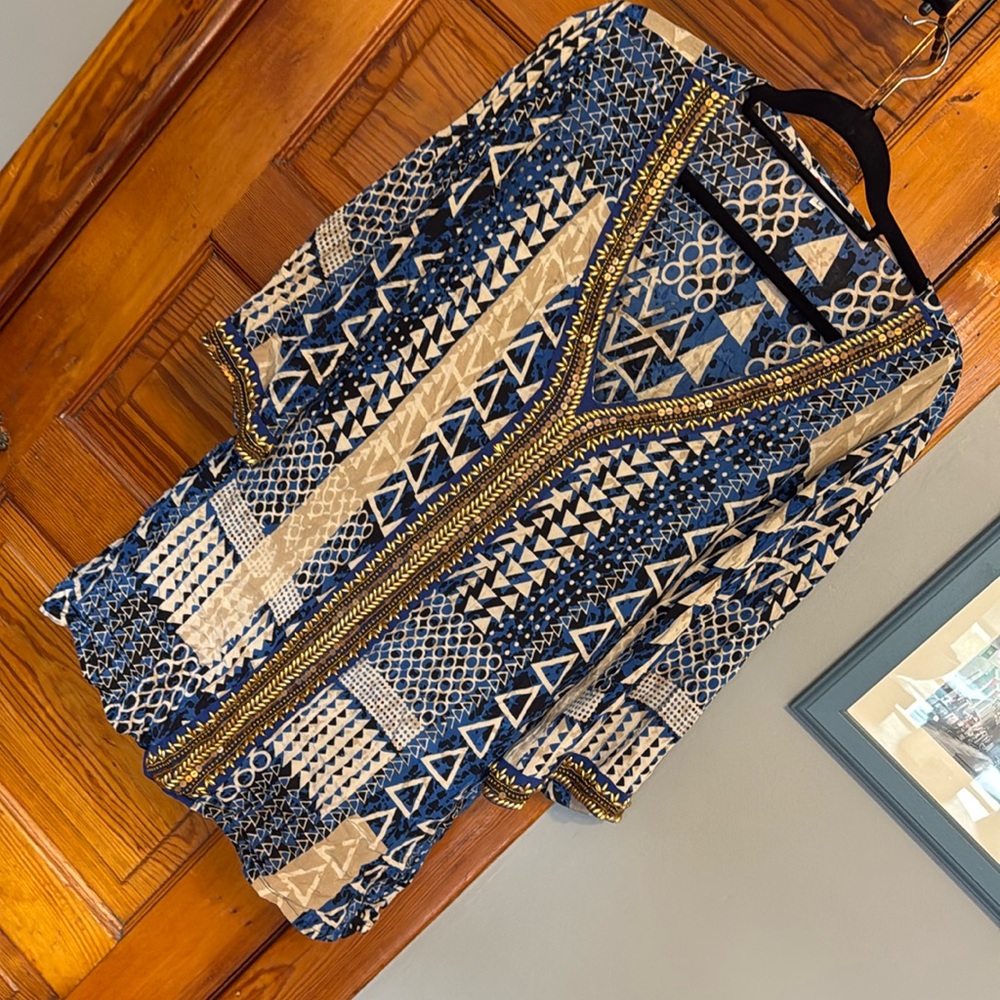 Adorable blue patterned cover up with great gold accents.